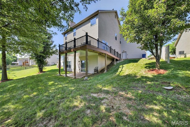 1304 Forest Way, Wentzville, MO 63385 - rear view of property featuring a deck, a patio, and a chimney