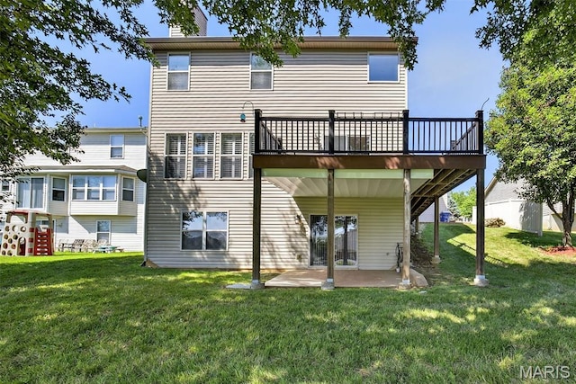 1304 Forest Way, Wentzville, MO 63385 - back of house featuring a lawn, a deck, a patio area, and a chimney