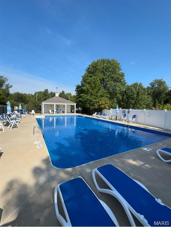 1304 Forest Way, Wentzville, MO 63385 - community pool featuring a patio