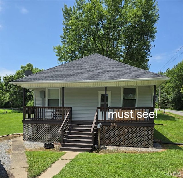 1414 Newton Ave, Johnston City, IL 62951 - bungalow with a shingled roof, covered porch, a front yard, and stairs