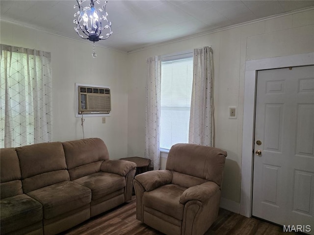1414 Newton Ave, Johnston City, IL 62951 - living room featuring dark wood-style flooring, ornamental molding, a wall mounted air conditioner, and a chandelier
