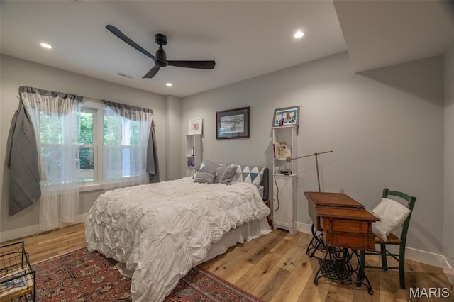 2740 Tyrol View Ct, Innsbrook, MO 63390 - bedroom with light wood-style flooring, recessed lighting, and a ceiling fan