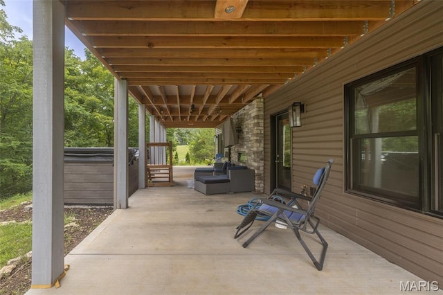 2740 Tyrol View Ct, Innsbrook, MO 63390 - view of patio / terrace with a hot tub