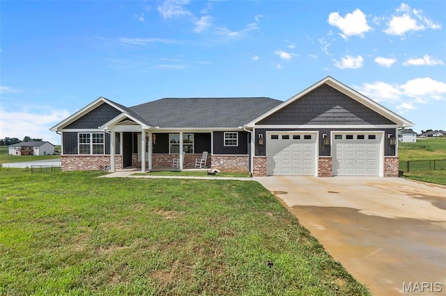 236 Haydens Trl, Jackson, MO 63755 - craftsman-style home featuring covered porch, an attached garage, brick siding, and driveway