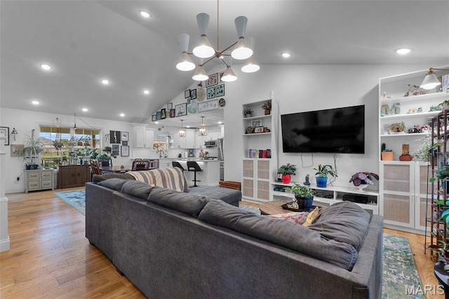 236 Haydens Trl, Jackson, MO 63755 - living area with light wood finished floors, a chandelier, high vaulted ceiling, and recessed lighting