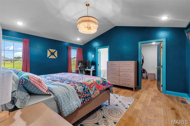 236 Haydens Trl, Jackson, MO 63755 - bedroom featuring wood finished floors, a chandelier, lofted ceiling, a spacious closet, and recessed lighting