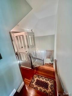 807B Wind Rivers Dr, Grafton, IL 62037 - stairs with lofted ceiling and wood finished floors