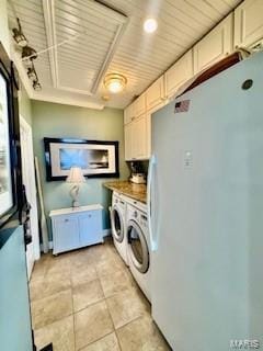807B Wind Rivers Dr, Grafton, IL 62037 - laundry room featuring washing machine and dryer and light tile patterned floors