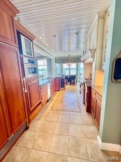 807B Wind Rivers Dr, Grafton, IL 62037 - kitchen with healthy amount of natural light, oven, and light countertops