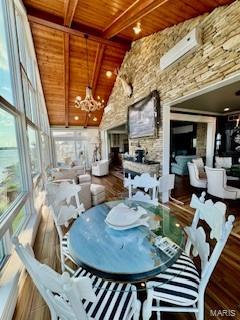 807B Wind Rivers Dr, Grafton, IL 62037 - sunroom / solarium with plenty of natural light and a chandelier