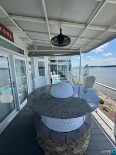 807B Wind Rivers Dr, Grafton, IL 62037 - sunroom / solarium with a water view, outdoor dining space, and healthy amount of natural light
