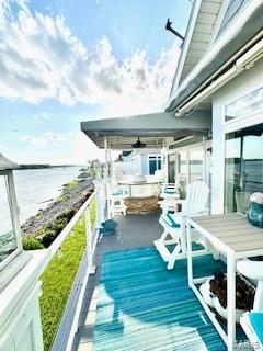 807B Wind Rivers Dr, Grafton, IL 62037 - wooden deck with a water view