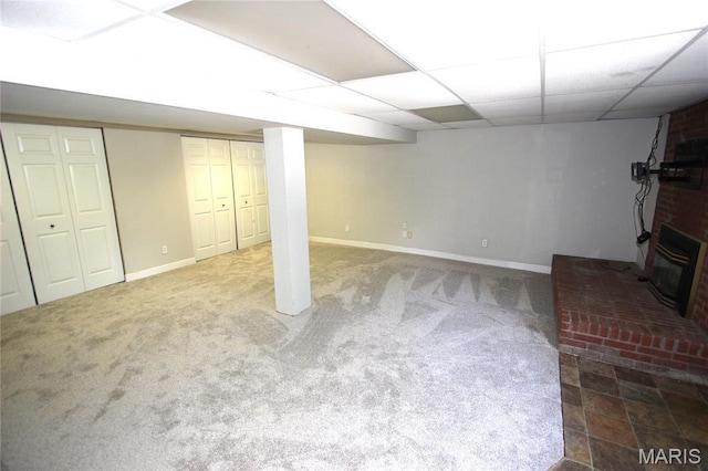 420 Lake Dr, Bonne Terre, MO 63628 - finished basement with a brick fireplace, a drop ceiling, and carpet floors