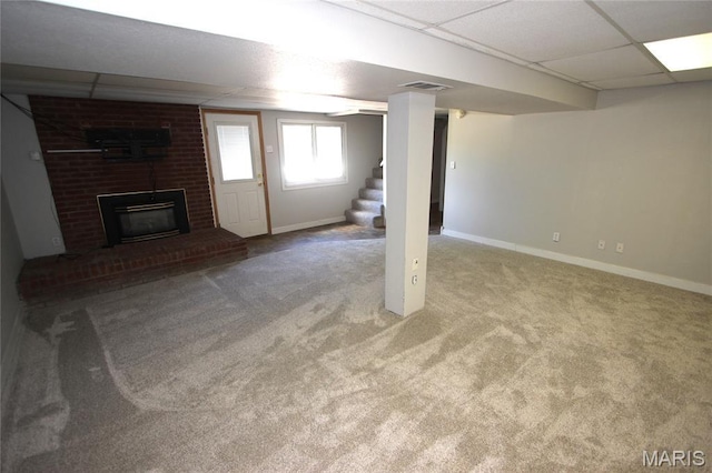 420 Lake Dr, Bonne Terre, MO 63628 - below grade area with a drop ceiling, carpet, stairs, and a brick fireplace