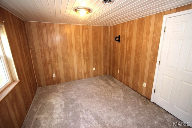 420 Lake Dr, Bonne Terre, MO 63628 - carpeted empty room with wood walls and wooden ceiling