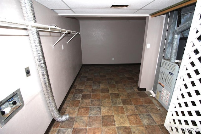 420 Lake Dr, Bonne Terre, MO 63628 - walk in closet featuring dark stone finish flooring and a paneled ceiling