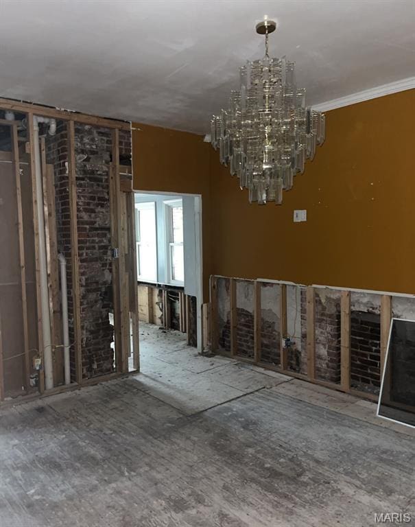 5185 Enright Ave, Saint Louis, MO 63108 - unfurnished living room featuring a chandelier