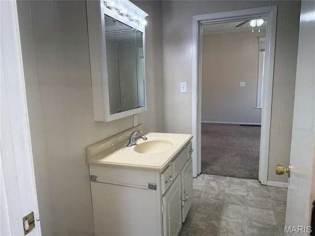 3313 Saint Charles St, Hannibal, MO 63401 - bathroom featuring vanity and baseboards