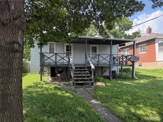 3313 Saint Charles St, Hannibal, MO 63401 - view of front of home featuring a front yard, stairs, and covered porch