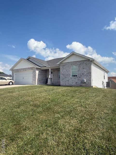 2519 Cortland Dr, Jackson, MO 63755 - ranch-style house featuring an attached garage, brick siding, a front lawn, and driveway