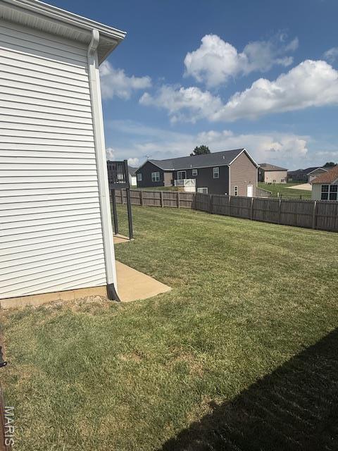 2519 Cortland Dr, Jackson, MO 63755 - fenced backyard featuring a residential view