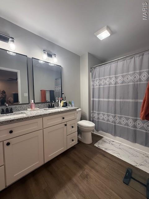 2519 Cortland Dr, Jackson, MO 63755 - bathroom with vanity, wood finished floors, and curtained shower