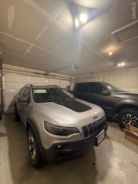 2519 Cortland Dr, Jackson, MO 63755 - garage featuring a garage door opener