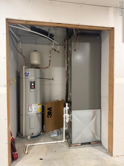 2519 Cortland Dr, Jackson, MO 63755 - utility room featuring electric water heater