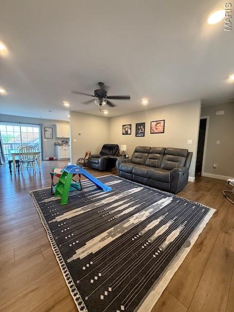 2519 Cortland Dr, Jackson, MO 63755 - living room with a ceiling fan, wood finished floors, and recessed lighting