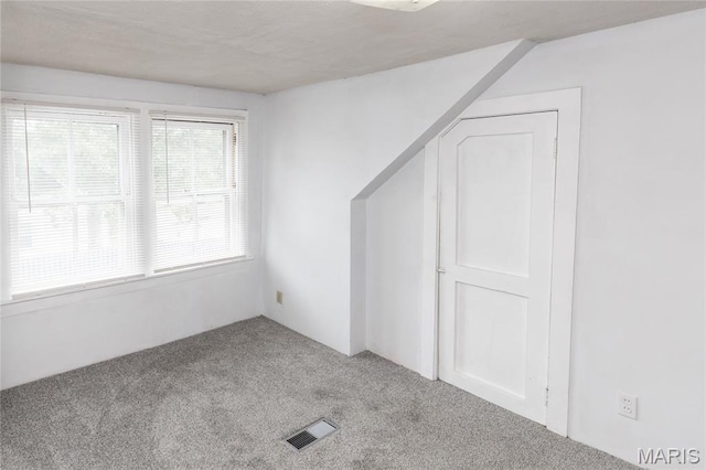711 Erskine Ave, Lemay Township, MO 63125 - spare room with carpet