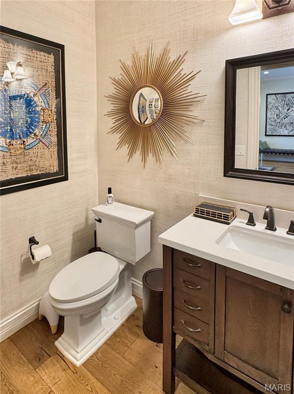 4 Market St, Washington, MO 63090 - bathroom featuring wood finished floors and vanity