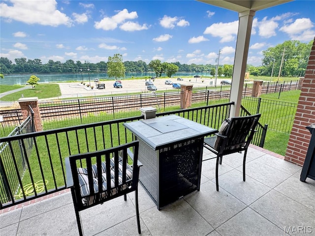 4 Market St, Washington, MO 63090 - view of patio / terrace featuring outdoor dining space and a water view