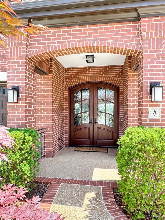 4 Market St, Washington, MO 63090 - entrance to property featuring brick siding and french doors