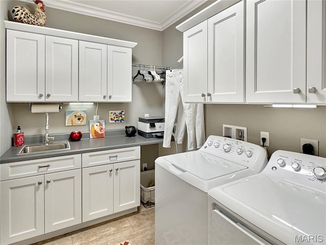 4 Market St, Washington, MO 63090 - washroom featuring washer and dryer, cabinet space, and crown molding