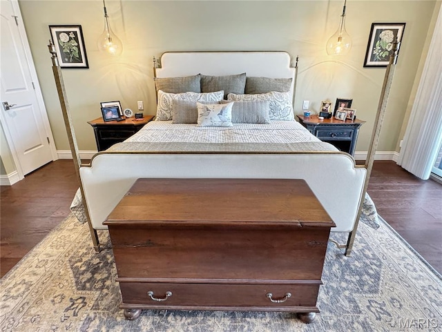 4 Market St, Washington, MO 63090 - bedroom with dark wood-type flooring and baseboards