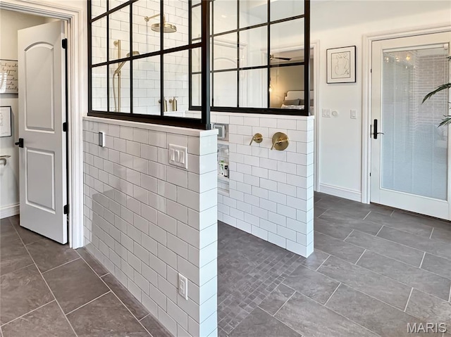 4 Market St, Washington, MO 63090 - bathroom with tile walls and tile patterned flooring