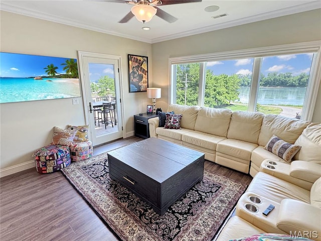 4 Market St, Washington, MO 63090 - living area with ceiling fan, wood finished floors, crown molding, and recessed lighting