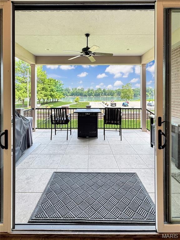 4 Market St, Washington, MO 63090 - view of patio / terrace featuring a water view and ceiling fan