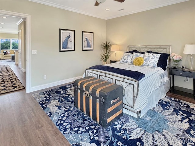 4 Market St, Washington, MO 63090 - bedroom featuring crown molding, wood finished floors, recessed lighting, and ceiling fan