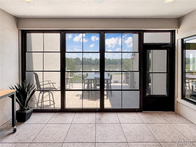 4 Market St, Washington, MO 63090 - doorway featuring light tile patterned flooring and healthy amount of natural light