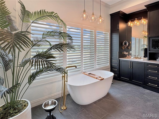 4 Market St, Washington, MO 63090 - bathroom with a freestanding tub, vanity, and crown molding