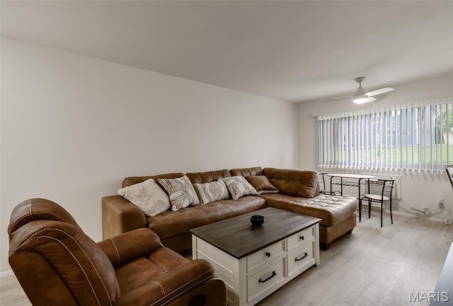8733 Sieloff Dr Unit C, Hazelwood, MO 63042 - living area featuring a ceiling fan and light wood finished floors
