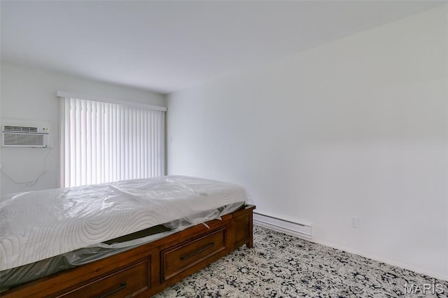 8733 Sieloff Dr Unit C, Hazelwood, MO 63042 - bedroom with baseboard heating and a wall mounted air conditioner