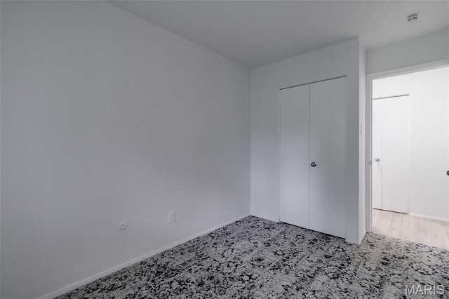 8733 Sieloff Dr Unit C, Hazelwood, MO 63042 - unfurnished bedroom featuring light carpet and a closet
