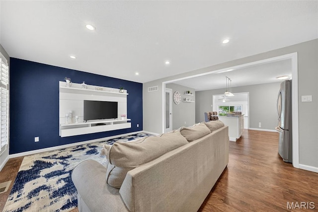 1002 Arlington Dr, Saint Charles, MO 63303 - living room with wood finished floors and recessed lighting