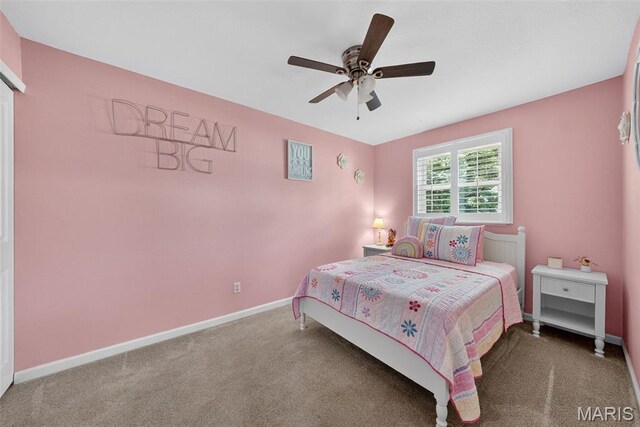 1002 Arlington Dr, Saint Charles, MO 63303 - carpeted bedroom with baseboards and ceiling fan