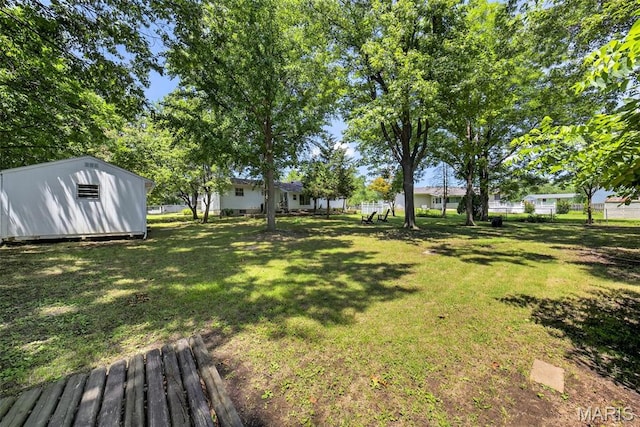 1002 Arlington Dr, Saint Charles, MO 63303 - view of yard featuring a storage shed