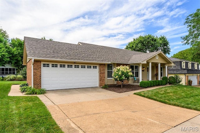 1730 Blakefield Ter, Manchester, MO 63021 - view of front facade featuring roof with shingles, driveway, brick siding, and a front yard