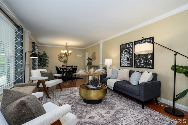 1730 Blakefield Ter, Manchester, MO 63021 - living area featuring a chandelier, wood finished floors, and crown molding