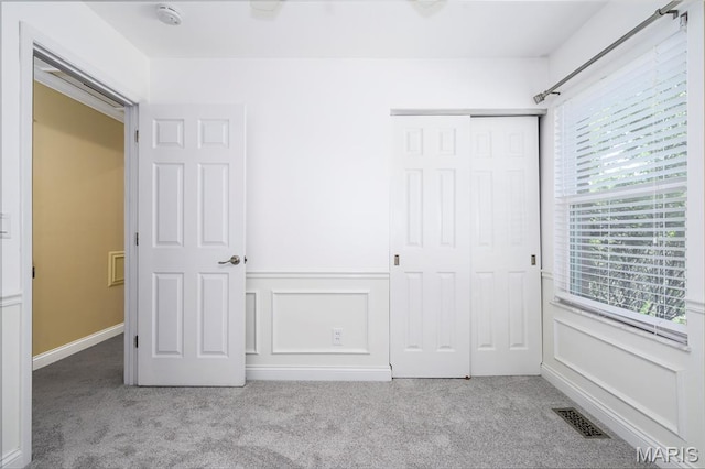1730 Blakefield Ter, Manchester, MO 63021 - unfurnished bedroom with carpet floors, a closet, and wainscoting